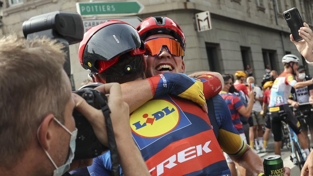 Denmark's Mads Pedersen, face to camera, celebrates with teammate France's Tony Gallopin after winning the eighth stage of the Tour de France cycling race over 201 kilometers (125 miles) with start in Libourne and finish in Limoges, France, Saturday, July 8, 2023. (Martin Divisek, Pool via AP)