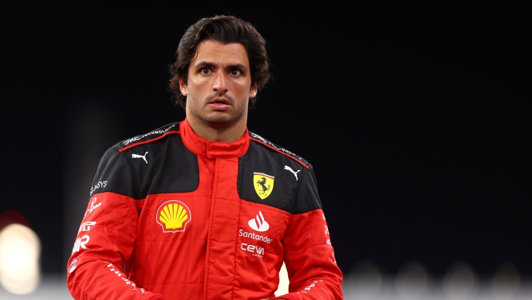 ABU DHABI, UNITED ARAB EMIRATES - NOVEMBER 23: Carlos Sainz of Spain and Ferrari looks on at the Ferrari Team Photo during previews ahead of the F1 Grand Prix of Abu Dhabi at Yas Marina Circuit on November 23, 2023 in Abu Dhabi, United Arab Emirates. (Photo by Clive Rose/Getty Images)