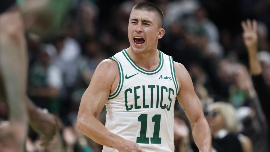 Boston Celtics' Payton Pritchard reacts after making a three-pointer during the second half of an NBA basketball game against the Milwaukee Bucks, Monday, Oct. 28, 2024, in Boston. (AP Photo/Michael Dwyer)