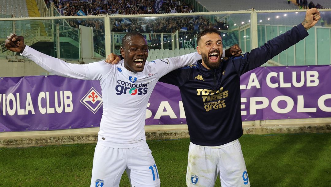 FLORENCE, ITALY - OCTOBER 23: Emmanuel Quartsin Gyasi of Empoli FC and Francesco Caputo of Empoli FC celebrates the victory after the Serie A TIM match between ACF Fiorentina and Empoli FC at Stadio Artemio Franchi on October 23, 2023 in Florence, Italy. (Photo by Gabriele Maltinti/Getty Images)