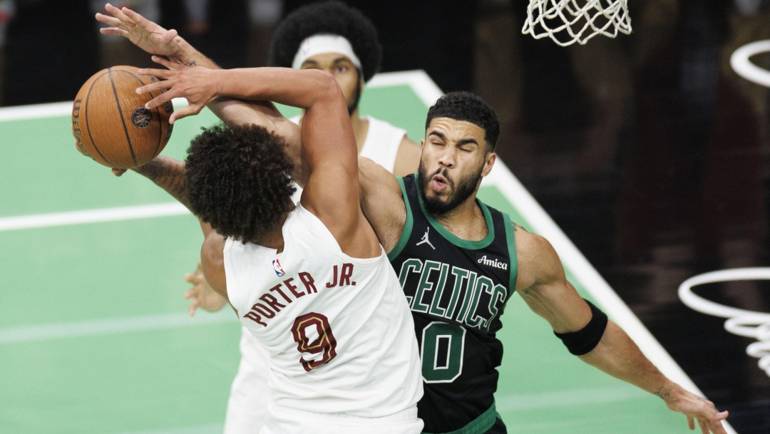 epa11730234 Boston Celtics forward Jayson Tatum blocks a shot by Cleveland Cavaliers guard Craig Porter Jr. during the second half of an NBA Cup tournament game in Boston, Massachusetts, USA, 19 November 2024.  EPA/CJ GUNTHER SHUTTERSTOCK OUT