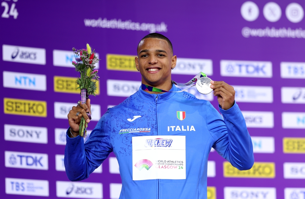 GLASGOW, SCOTLAND - MARCH 03: Silver medalist Lorenzo Ndele Simonelli of Team Italy poses for a photo during the medal ceremony for the Men's 60 Metres Hurdles Final on Day Three of the World Athletics Indoor Championships Glasgow 2024 at Emirates Arena on March 03, 2024 in Glasgow, Scotland. (Photo by Michael Steele/Getty Images)