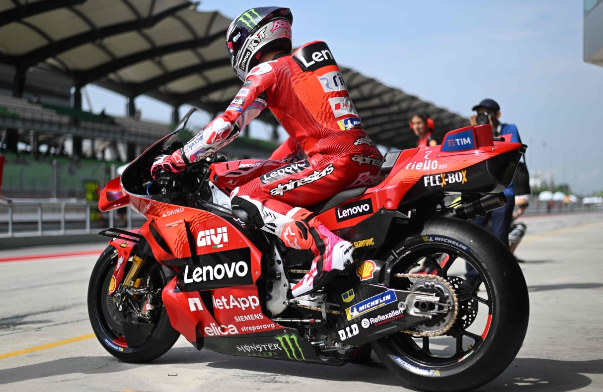 Ducati Lenovo Team's Italian rider Enea Bastianini leaves the pit lane during the first day of the pre-season MotoGP test at the Sepang International Circuit in Sepang on February 6, 2024. (Photo by Mohd RASFAN / AFP)