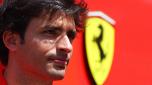 BARCELONA, SPAIN - MAY 19: Carlos Sainz of Spain and Ferrari talks to the media in the Paddock during previews ahead of the F1 Grand Prix of Spain at Circuit de Barcelona-Catalunya on May 19, 2022 in Barcelona, Spain. (Photo by Lars Baron/Getty Images)