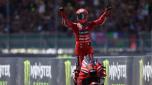 Ducati Lenovo's Italian rider Francesco Bagnaia celebrates his win in the MotoGP race of the British Grand Prix at Silverstone circuit in Northamptonshire, central England, on August 7, 2022. (Photo by ADRIAN DENNIS / AFP)