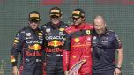First place Red Bull driver Max Verstappen of the Netherlands, second left, celebrates on the podium with second place Red Bull driver Sergio Perez of Mexico, left, and third place Ferrari driver Carlos Sainz of Spain, second right, during the Formula One Grand Prix at the Spa-Francorchamps racetrack in Spa, Belgium, Sunday, Aug. 28, 2022. (AP Photo/Olivier Matthys)