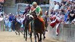 Jockey Giovanni Atzeni, called Tittia, on horse Violenta Da Codia, wins the historical Italian horse race Palio di Siena, in Siena, Italy, 02 July 2023.  ANSA/CLAUDIO GIOVANNINI