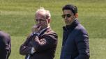 epa10638505 PSG's soccer advisor Luis Campos (L) talks to PSG's president Nasser Al-Khelaifi (R) during the team's training session at the Camp des Loges sports complex in Saint Germain en Laye, near Paris, France, 19 May 2023. PSG prepares for a French Ligue 1 match against AJ Auxerre on 21 May.  EPA/CHRISTOPHE PETIT TESSON