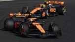 SUZUKA, JAPAN - SEPTEMBER 24: Oscar Piastri of Australia driving the (81) McLaren MCL60 Mercedes leads Lando Norris of Great Britain driving the (4) McLaren MCL60 Mercedes during the F1 Grand Prix of Japan at Suzuka International Racing Course on September 24, 2023 in Suzuka, Japan. (Photo by Clive Mason/Getty Images)