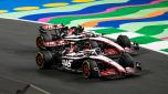JEDDAH STREET CIRCUIT, SAUDI ARABIA - MARCH 19: Kevin Magnussen, Haas VF-23, leads Nico Hulkenberg, Haas VF-23 during the Saudi Arabian GP at Jeddah Street Circuit on Sunday March 19, 2023 in Jeddah, Saudi Arabia. (Photo by Mark Sutton / LAT Images)