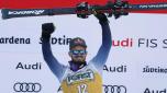 The winner Italy's Dominik Paris celebrates after an alpine ski, men's World Cup downhill race, in Val Gardena, Italy, Saturday, Dec. 16, 2023. (AP Photo/Alessandro Trovati)