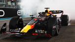 ABU DHABI, UNITED ARAB EMIRATES - NOVEMBER 26: Race winner Max Verstappen of the Netherlands driving the (1) Oracle Red Bull Racing RB19 performs donuts on track during the F1 Grand Prix of Abu Dhabi at Yas Marina Circuit on November 26, 2023 in Abu Dhabi, United Arab Emirates. (Photo by Mark Thompson/Getty Images)