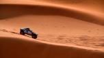 Team Audi Sport's Swedish driver Mattias Ekstrom and his Swedish co-driver Emil Bergkvist steer their car in the dunes during the stage 8 of the 2024 Dakar Rally, between Al Duwadimi and Hail, Saudi Arabia, on January 15, 2024. (Photo by PATRICK HERTZOG / AFP)