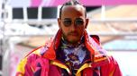 NORTHAMPTON, ENGLAND - JUNE 30: Lewis Hamilton of Great Britain and Mercedes walks in the Paddock during previews ahead of the F1 Grand Prix of Great Britain at Silverstone on June 30, 2022 in Northampton, England. (Photo by Clive Mason/Getty Images)