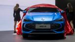 epa11182394 Hostesses unveil the new MG3 hybrid electric car during media day of the 91st Geneva International Motor Show (GIMS) in Geneva, Switzerland, 26 February 2024. The motor show will open to the public from 27 February to 03 March.  EPA/MARTIAL TREZZINI