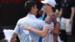 MELBOURNE, AUSTRALIA - JANUARY 26: Jannik Sinner of Italy shakes hands with Novak Djokovic of Serbia in their Semifinal singles match during the 2024 Australian Open at Melbourne Park on January 26, 2024 in Melbourne, Australia. (Photo by Darrian Traynor/Getty Images)