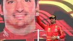 Ferrari's Spanish driver Carlos Sainz Jr celebrates his third-placed finish on the podium after the end of the Formula One Japanese Grand Prix race at the Suzuka circuit in Suzuka, Mie prefecture on April 7, 2024. (Photo by Yuichi YAMAZAKI / AFP)