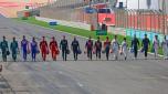 Drivers pose on the starting grid during the first day of Formula One (F1) pre-season testing at the Bahrain International Circuit in the city of Sakhir on March 12, 2021. (Photo by Giuseppe CACACE / AFP)