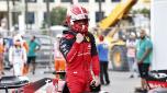Ferrari driver Charles Leclerc of Monaco celebrates after setting the pole position in the qualifying session at the Baku circuit, in Baku, Azerbaijan, Saturday, June 11, 2022. The Formula One Grand Prix will be held on Sunday. (Hamad Mohammed, Pool Via AP)