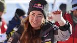 Italy's Sofia Goggia salutes in the finish area after crossing the finish line to win an alpine ski, women's World Cup downhill race, in St. Moritz, Switzerland, Saturday, Dec. 17, 2022. (AP Photo/Marco Trovati)