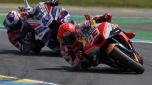Spain's rider Marc Marquez of the Repsol Honda Team steers his motorcycle followed by Spain's rider Jorge Martin of the Prima Pramac Racing during the MotoGP race of the French Motorcycle Grand Prix at the Le Mans racetrack, in Le Mans, France, Sunday, May 14, 2023. (AP Photo/Jeremias Gonzalez)