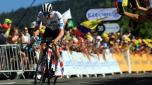 epa10746367 Slovenian rider Tadej Pogacar of team UAE Team Emirates arrives at the finish at 3rd place during the 13th stage of the Tour de France 2023, a 138kms race from Chatillon-Sur-Charlaronne to Grand Colombier, France, 14 July 2023.  EPA/MARTIN DIVISEK