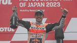 Third placed Repsol Honda Team rider Marc Marquez of Spain celebrates on the podium of the MotoGP Japanese Grand Prix at the Mobility Resort Motegi in Motegi, Tochigi prefecture on October 1, 2023. (Photo by Toshifumi KITAMURA / AFP)