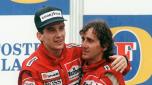 TO GO WITH STORYS ON THE 10TH ANNIVERSAY OF THE DEATH OF BRAZILIAN F1 RACING DRIVER AYRTON SENNA  : (FILES) -  Brazilian formula one champion Ayrton Senna (L) embraces his teammate and winner of Australian Grand Prix, French driver Alain Prost, on the podium of the Adelaide racetrack, 18 November 1988. Ayrton Senna died 01 May 1994 in a crash on the Imola racetrack, during the San Marino Grand Prix.    AFP PHOTO