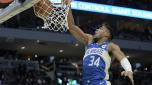 Milwaukee Bucks' Giannis Antetokounmpo dunks during the second half of an NBA basketball game against the New York Knicks Tuesday, Dec. 5, 2023, in Milwaukee. The Bucks won 146-122. (AP Photo/Morry Gash)