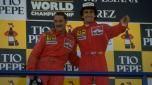 1990:  Scuderia Ferrari drivers Nigel Mansell (left) of Great Britain and Alain Prost (right) of France stand on the winners'' podium after the Spanish Grand Prix at the Jerez circuit in Spain. Prost finished in first place and Mansell in second. \ Mandatory Credit: Pascal  Rondeau/Allsport