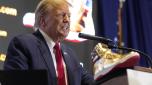 Republican presidential candidate former President Donald Trump attends Sneaker Con Philadelphia, an event popular among sneaker collectors, in Philadelphia, Saturday, Feb. 17, 2024. Trump announced a line of shoes bearing his name. (AP Photo/Manuel Balce Ceneta)