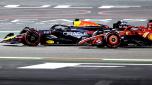 epa11194080 Red Bull Racing driver Max Verstappen (L) of the Netherlands and Scuderia Ferrari driver Charles Leclerc of Monaco in action during the Formula One Bahrain Grand Prix, at Bahrain International Circuit in Sakhir, Bahrain, 02 March 2024.  EPA/ALI HAIDER