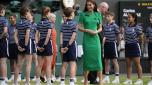 Kate, Princess of Wales greets ballboys and ballgirls as she arrives for the presentation ceremony for the final of the men's singles on day fourteen of the Wimbledon tennis championships in London, Sunday, July 16, 2023. (AP Photo/Kirsty Wigglesworth)