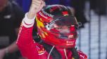 Ferrari driver Carlos Sainz of Spain celebrates after winning the Australian Formula One Grand Prix at Albert Park, in Melbourne, Australia, Sunday, March 24, 2024. (AP Photo/Scott Barbour)