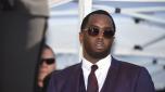 (FILES) Sean "Diddy" Combs attends the star ceremony for Mary J. Blige, on the Hollywood Walk of Fame, January 11, 2018 in Hollywood, California. More sexual assault claims have been filed against Sean Combs in New York, after the rap mogul known as "Diddy" and R&B singer Cassie settled a suit alleging physical abuse and rape last week. A lawsuit filed November 23 by Joi Dickerson-Neal alleged she had been "drugged, sexually assaulted and abused" in 1992 by the rapper, also known as "Puff Daddy," and that he had filmed and distributed the acts as "revenge porn." The suits have been submitted under the New York Adult Survivors Act, a law that opened a one-year window for sexual assault claims to be filed that otherwise happened too far in the past to litigate. (Photo by Robyn Beck / AFP)
