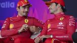 Race winner Ferrari driver Carlos Sainz of Spain talks with second placed teammate Charles Leclerc, left, of Monaco at a press conference following the Australian Formula One Grand Prix at Albert Park, in Melbourne, Australia, Sunday, March 24, 2024. (AP Photo/Scott Barbour)