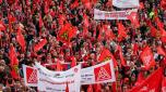 Members of the IG Metall metalworkers union demonstrate on September 25, 2024 in Hanover, northern Germany, where talks between unions and the Volkswagen management are taking place following an announcement of German carmaker Volkswagen (VW) that drastic cost-cutting measures are needed to keep the carmaker competitive. After Volkswagen's bombshell announcement earlier in September 2024 that it could close factories in Germany for the first time, company management and unions will begin tense talks on a new pay deal. Volkswagen has repeatedly stressed that its costs are excessive and profit margins too low, particularly at its core VW brand. (Photo by RONNY HARTMANN / AFP)