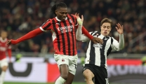  Rafael Leao of AC Milan and Kenan Yıldız of Juventus compete for the ball during the Serie match between Milan and Juventus at Stadio Giuseppe Meazza on November 23, 2024 in Milan, Italy. (Photo by Claudio Villa/AC Milan via Getty Images)