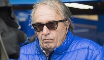   Carlo Pernat of Italy and riders manager speaks with journalists in box waiting the start of the MotoGP race during the MotoGp Of Great Britain - Race at Silverstone Circuit on August 26, 2018 in Northampton, England.  (Photo by Mirco Lazzari gp/Getty Images)