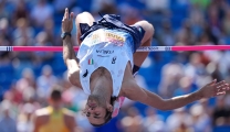 Italy's Gianmarco Tamberi makes an attempt in the men's high jump qualifying at the European Athletics Championships in Birmingham, England, Tuesday, Aug. 11, 2026. (AP Photo/Matthias Schrader)