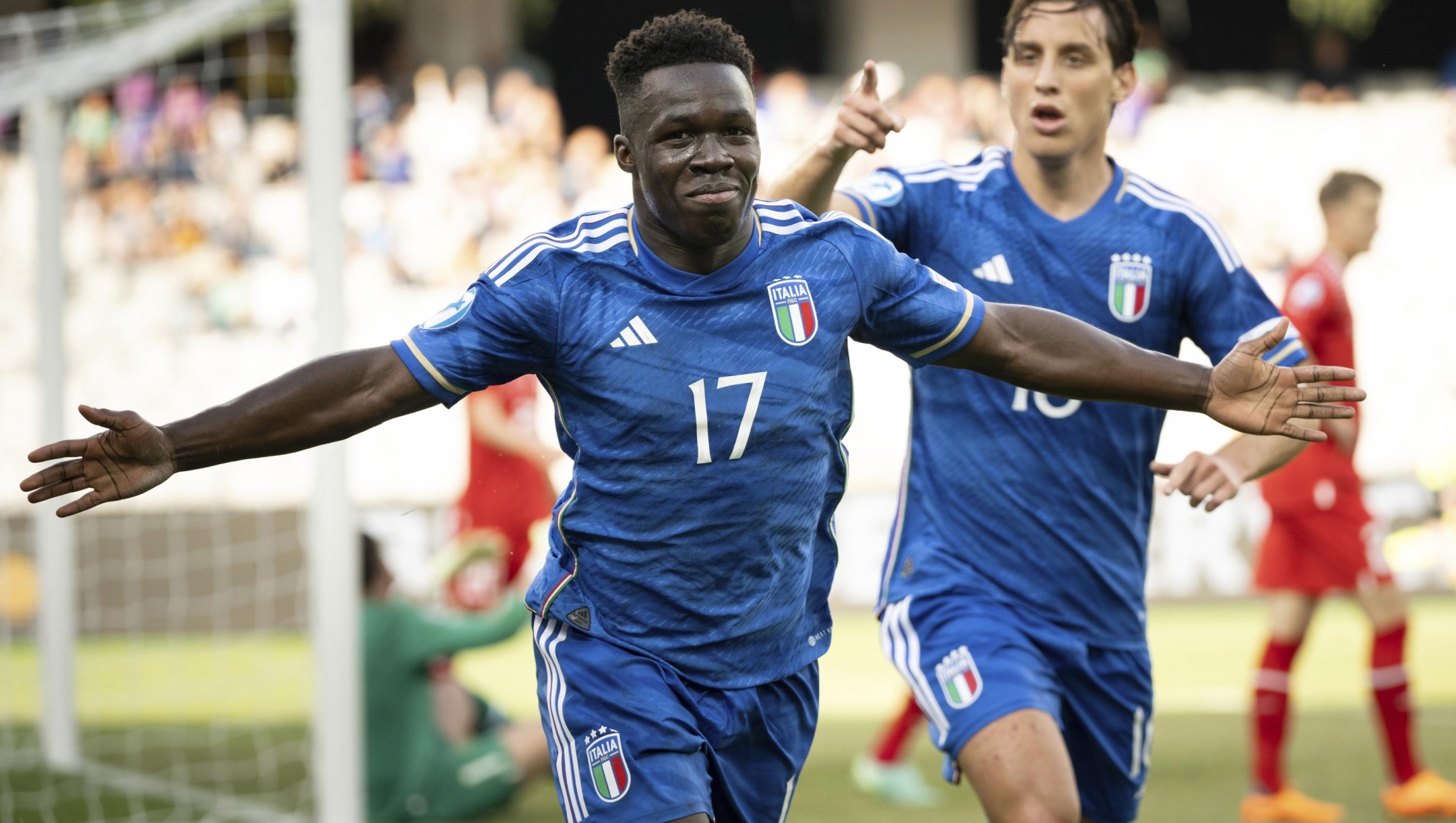 Italy's Wilfried Gnonto, celebrates scoring his side's second goal during the Under 21 European Championships soccer match between Switzerland and Italy at the European Under-21 Championship tournament in the Cluj Arena in Cluj-Napoca, Romania, Sunday June 25, 2023. (Georgios Kefalas/Keystone via AP)