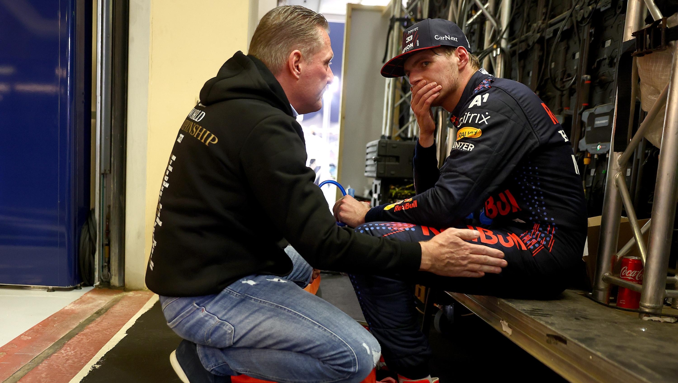 ABU DHABI, UNITED ARAB EMIRATES - DECEMBER 12: Race winner and 2021 F1 World Drivers Champion Max Verstappen of Netherlands and Red Bull Racing celebrates with his father Jos Verstappen in parc ferme during the F1 Grand Prix of Abu Dhabi at Yas Marina Circuit on December 12, 2021 in Abu Dhabi, United Arab Emirates. (Photo by Mark Thompson/Getty Images)