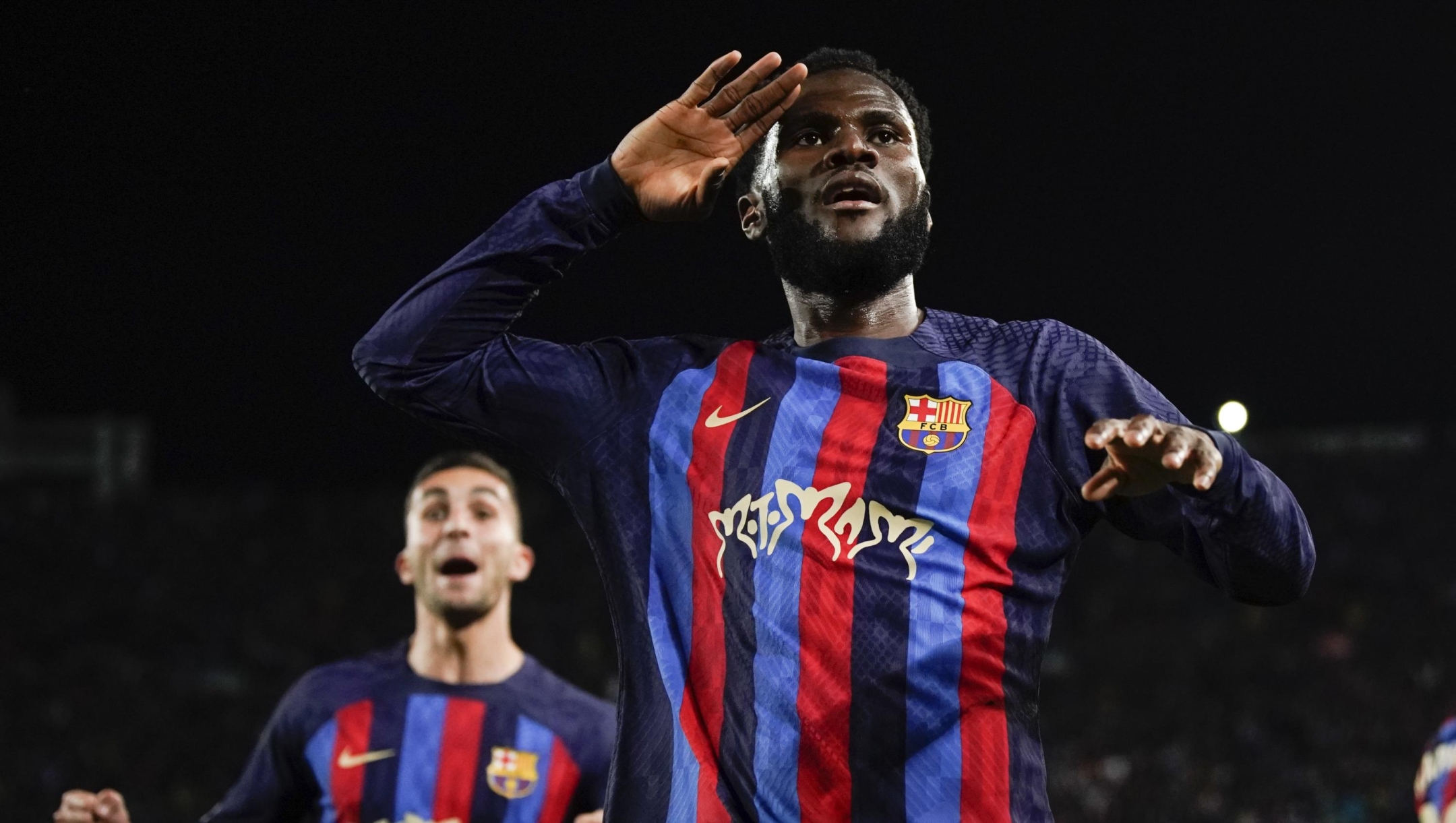 Barcelona's Franck Kessie celebrates after scoring his team's second goal during the Spanish La Liga soccer match between Barcelona and Real Madrid at Camp Nou stadium in Barcelona, Spain, Sunday, March 19, 2023. (AP Photo/Joan Mateu)