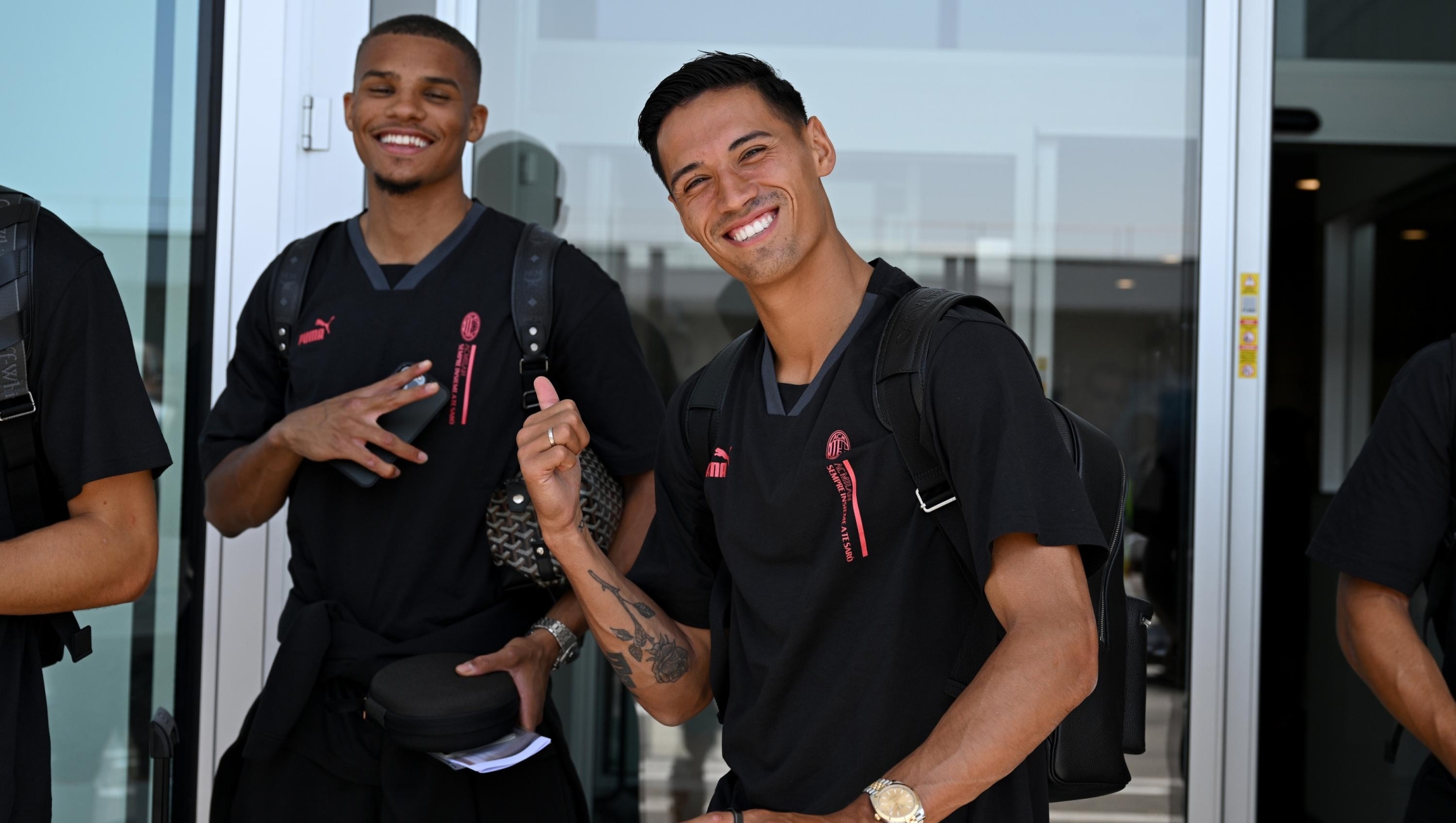 MILAN, ITALY - JULY 21: Tijjani Reijnders and Malick Thiaw smile ahead of AC Milan travel To Los Angeles on July 21, 2023 in Milan, Italy. (Photo by Claudio Villa/AC Milan via Getty Images)