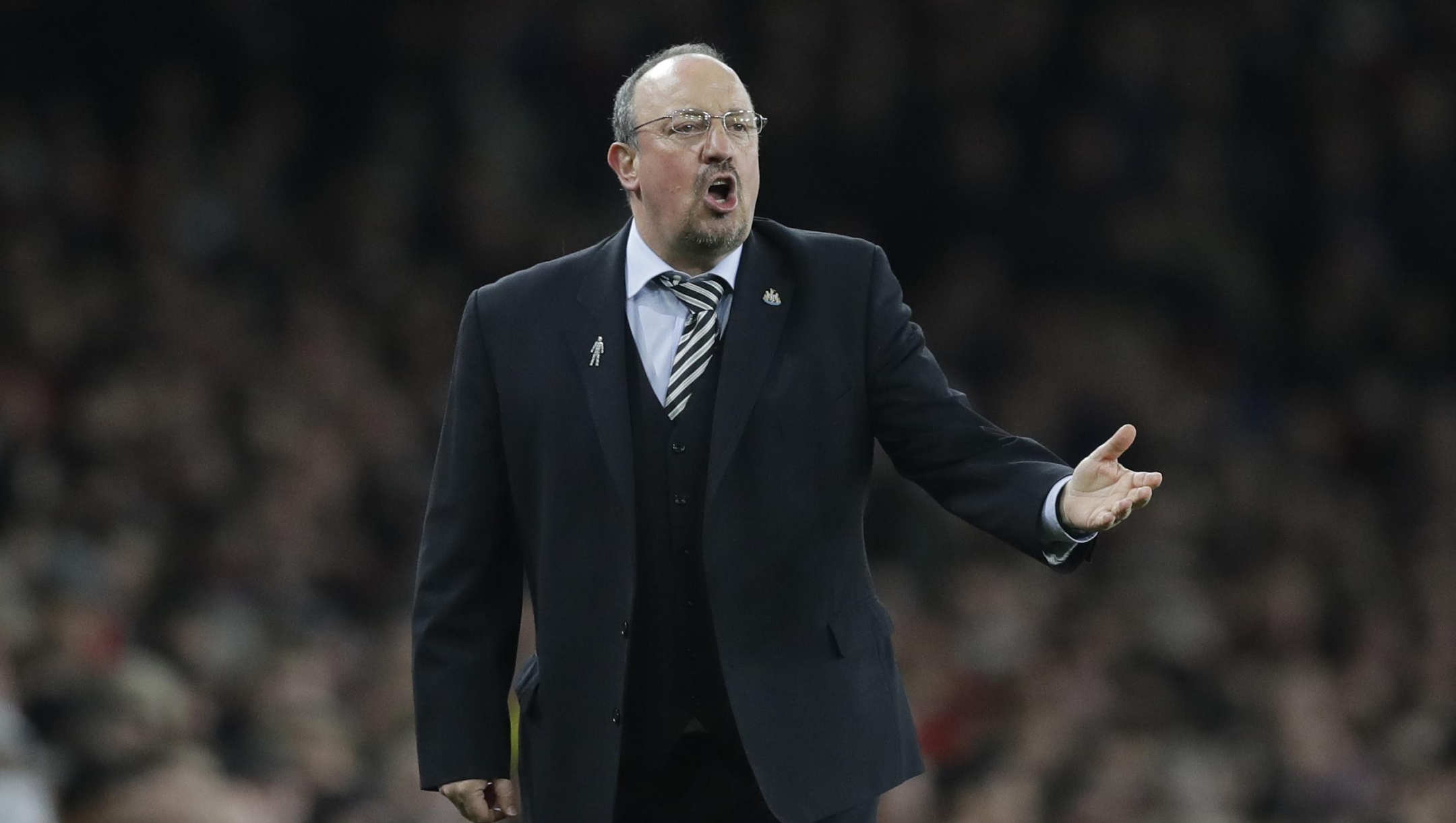 FILE - In this file photo dated Monday, April 1, 2019, Newcastle's then manager Rafael Benitez gestures during the English Premier League soccer match against Arsenal at Emirates stadium in London. Rafa Benitez has been officially introduced as Celta Vigo?s new coach. He says he accepted the Spanish club?s offer because he wanted to be back in a top league and closer to home. (AP Photo/Kirsty Wigglesworth, File)