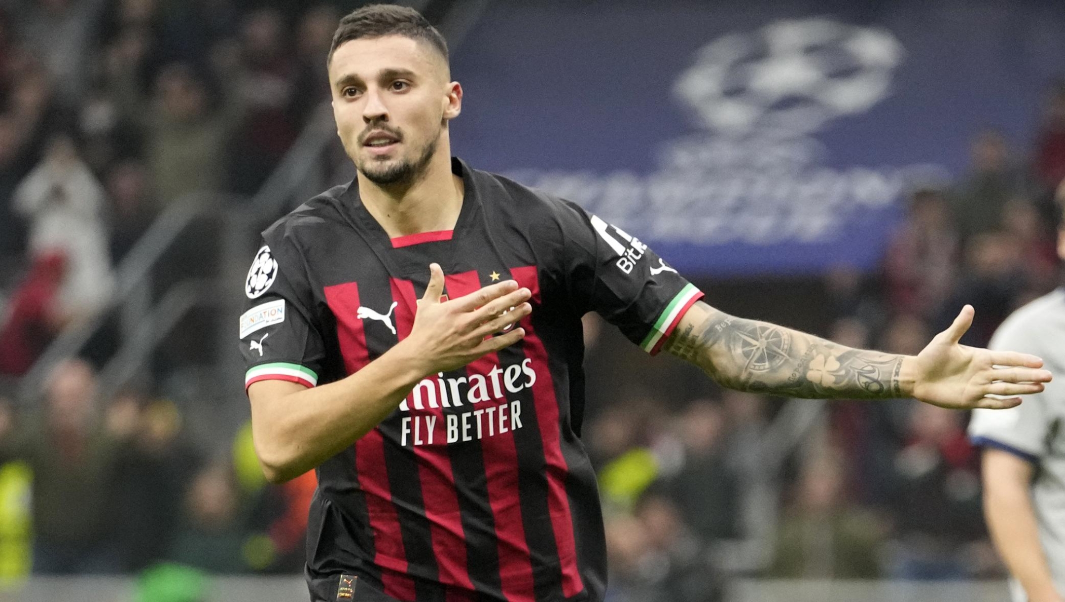 AC Milan's Rade Krunic celebrates after scoring his side's second goal during the Champions League, Group E soccer match between AC Milan and FC Salzburg, at the San Siro stadium in Milan, Italy, Wednesday, Nov. 2, 2022. (AP Photo/Luca Bruno)