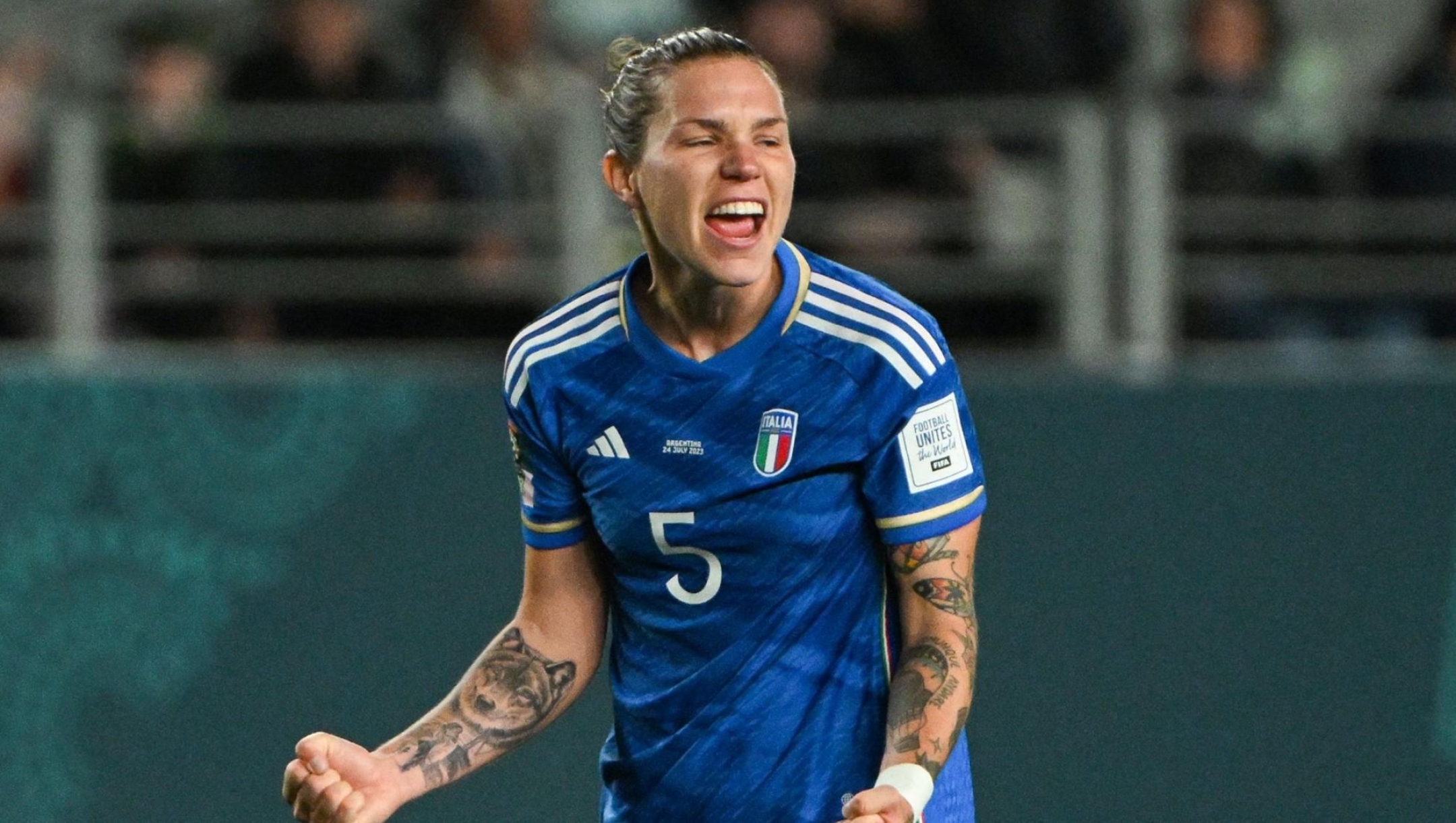 Italy's defender #05 Elena Linari celebrates her team's victory after the final whistle of the Australia and New Zealand 2023 Women's World Cup Group G football match between Italy and Argentina at Eden Park in Auckland on July 24, 2023. (Photo by Saeed KHAN / AFP)