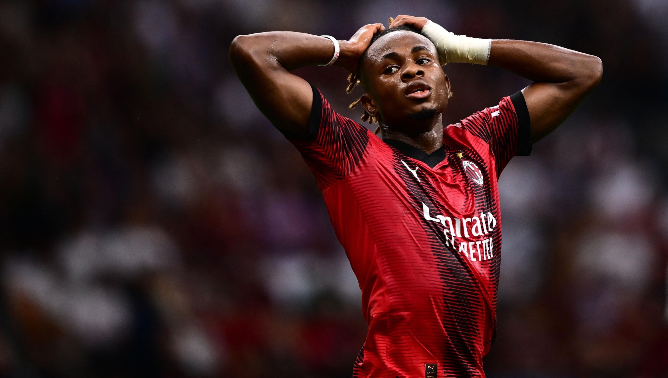 AC Milan's Nigerian midfielder #21 Samuel Chukwueze reacts during the UEFA Champions League 1st round group F football match between AC Milan and Newcastle at the San Siro stadium in Milan on September 19, 2023. (Photo by Marco BERTORELLO / AFP)