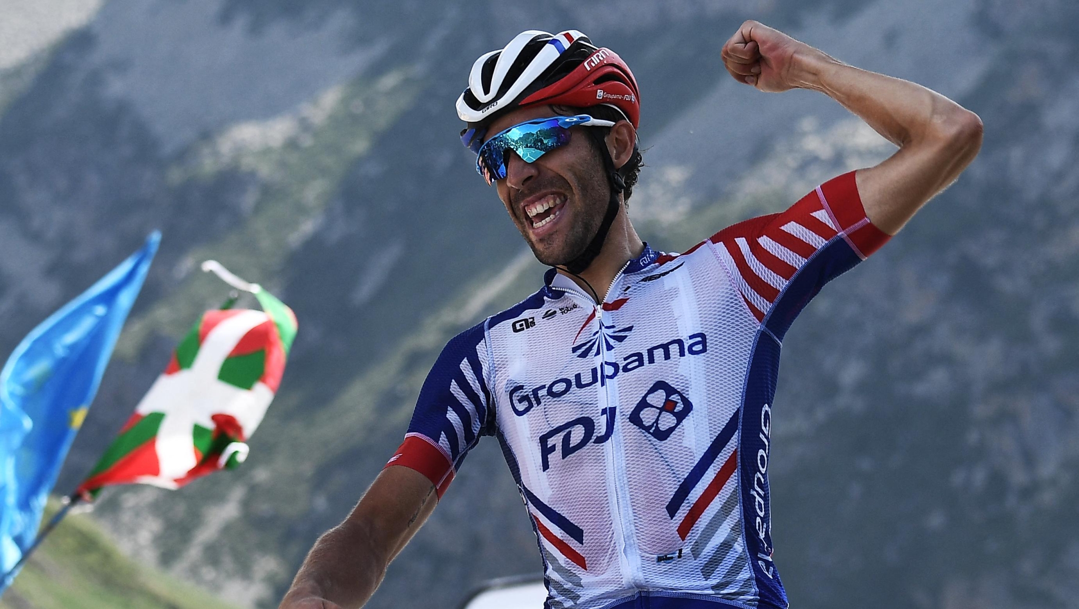 (FILES) France's Thibaut Pinot celebrates as he wins on the finish line of the fourteenth stage of the 106th edition of the Tour de France cycling race between Tarbes and Tourmalet Bareges, in Tourmalet Bareges on July 20, 2019. Thibaut Pinot, the idol of French cycling, is putting in his final pedal strokes this week in Italy before hanging up his bike for good and leaving behind the legacy of a rider like no other. (Photo by Anne-Christine POUJOULAT / AFP)