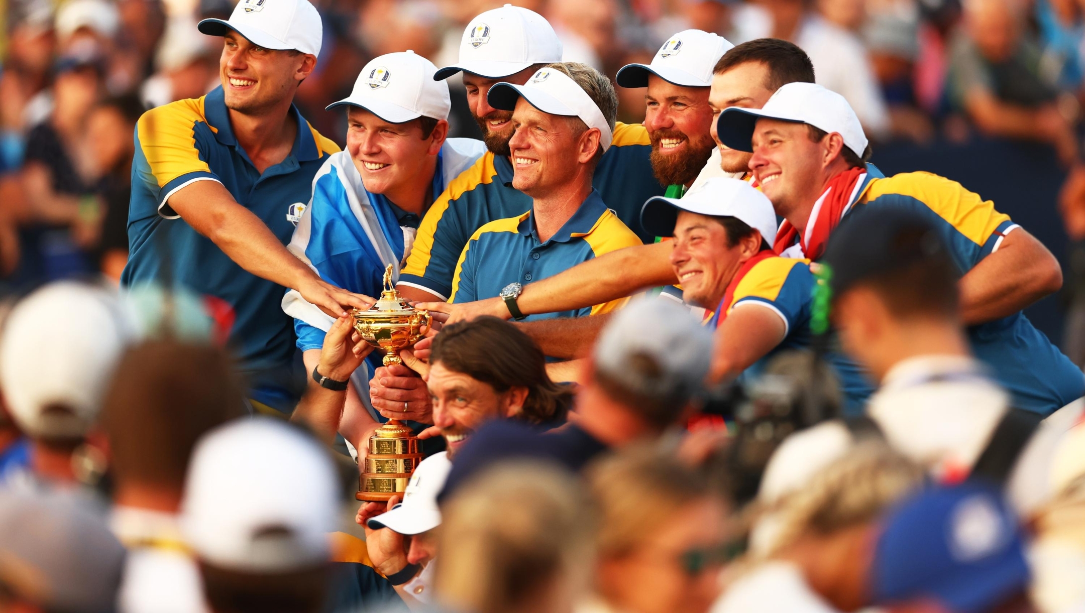 ROME, ITALY - OCTOBER 01: Team Europe Captain Luke Donald lifts the trophy with his team after his team win during the Sunday singles matches of the 2023 Ryder Cup at Marco Simone Golf Club on October 01, 2023 in Rome, Italy. (Photo by Naomi Baker/Getty Images)